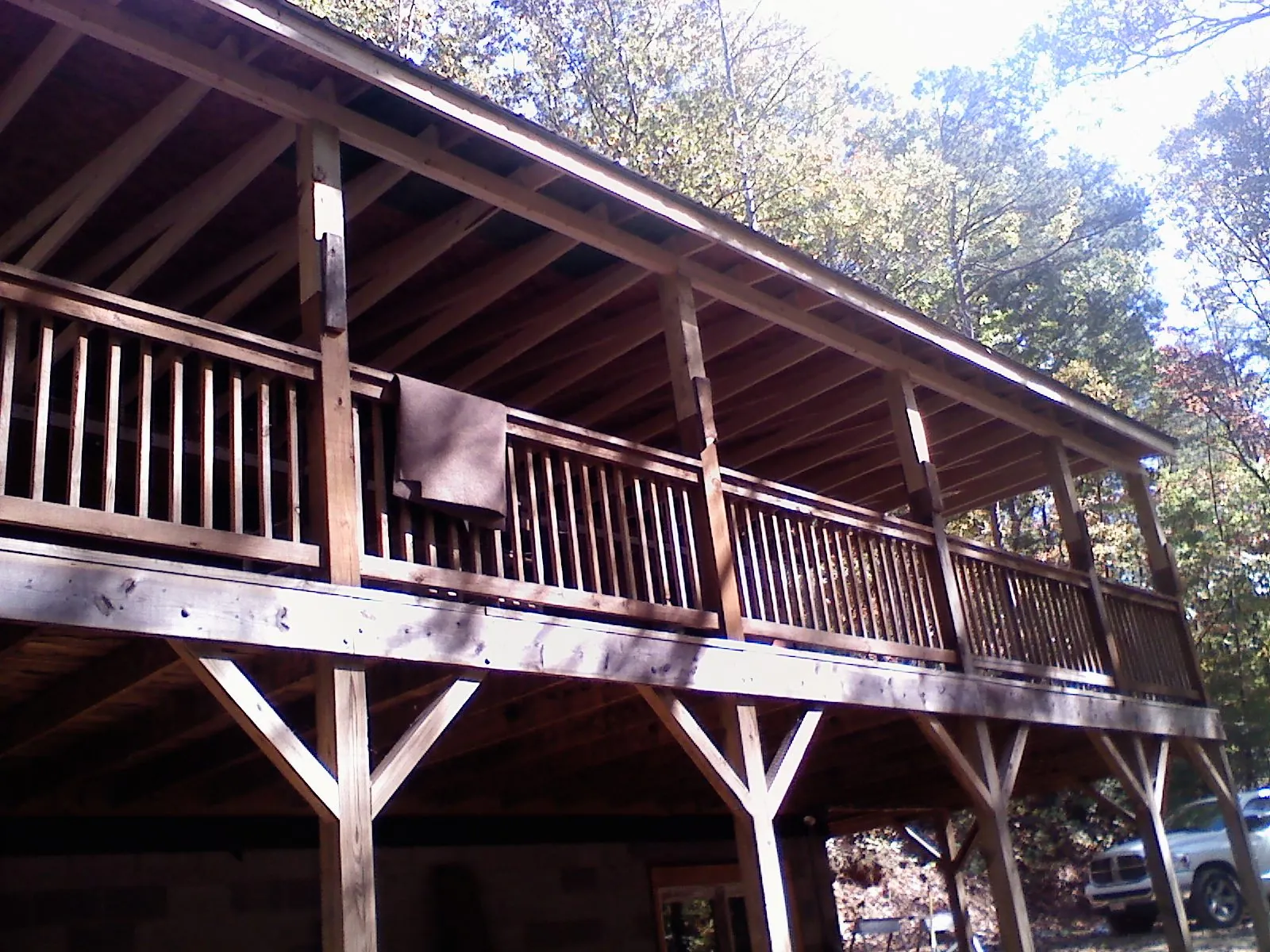 Timber framing under a new elevated porch and deck — Roof Leak Repair in Beach Lake by Roofing Brothers